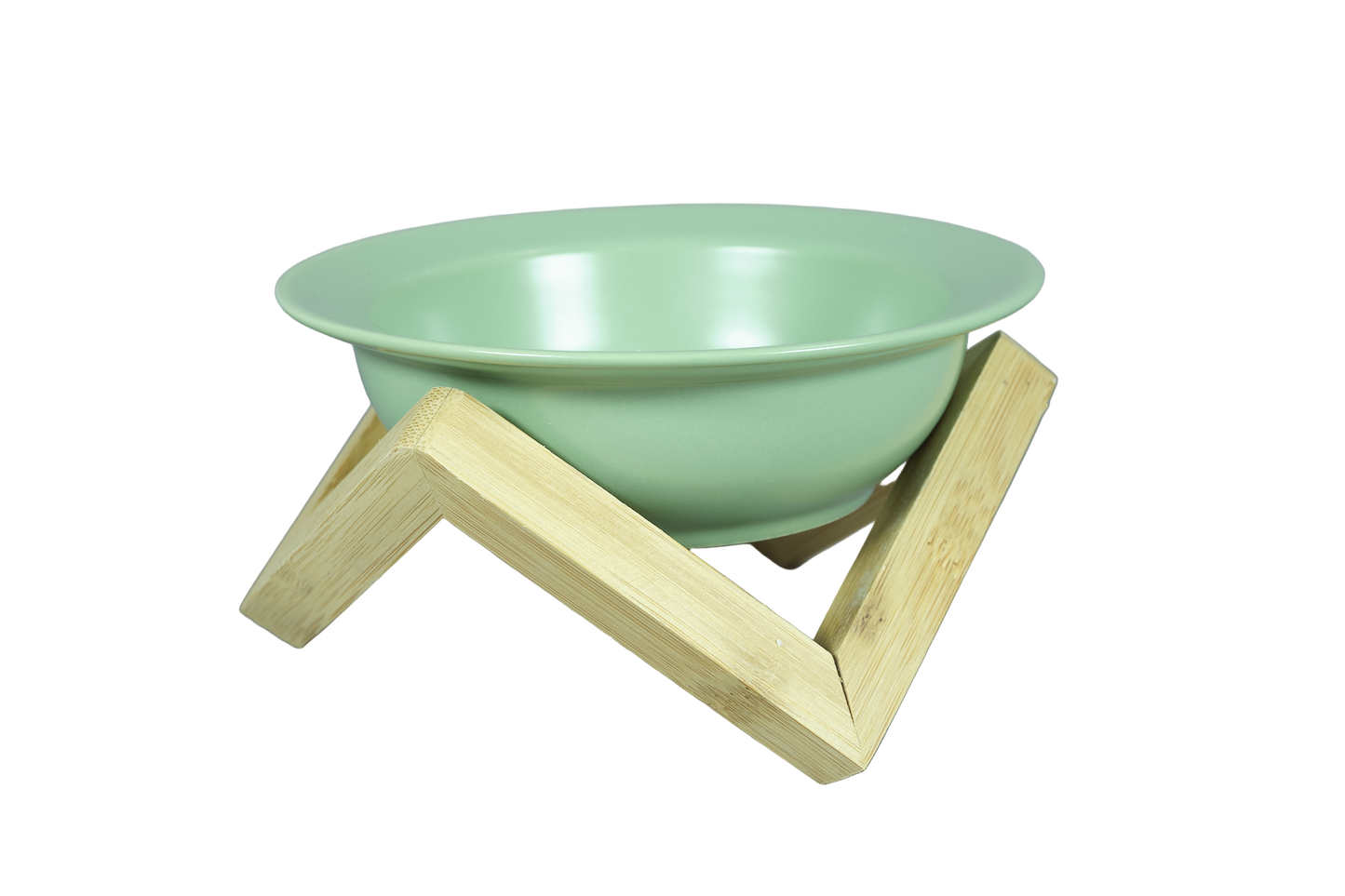 Green elevated ceramic cat bowl on bamboo stand.