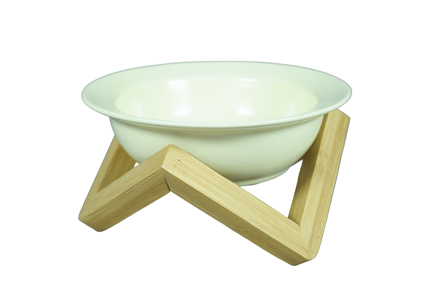 Cream elevated ceramic cat bowl on bamboo stand.