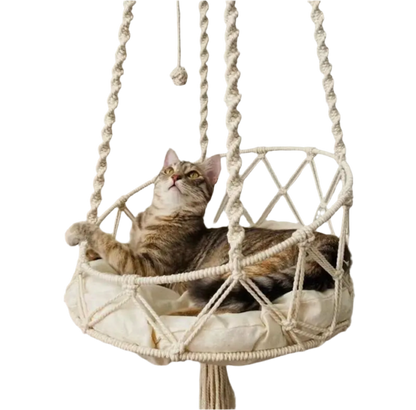 Hanging cotton cat hammock with twisted rope detail.