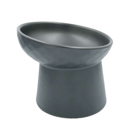 black tilted ceramic cat bowl with elevated base

elevated ceramic pet bowl with slanted design for cats

tilted raised ceramic cat food bowl with kibble

modern black ceramic cat water and food bowl