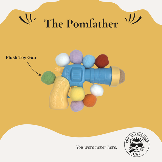 Interactive cat toy blaster with colourful plush balls – The Pomfather from The Apartment Cat. 
