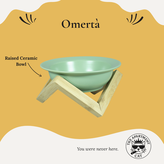 Raised ceramic bowl on a wooden stand - Omertà from The Apartment Cat